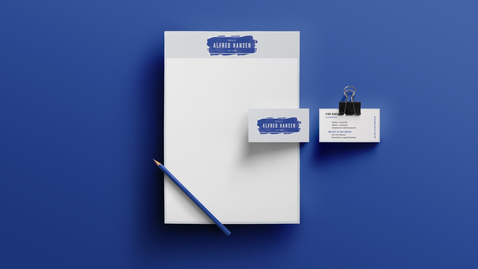 Komplette Geschäftsausstattung mit Geschäftsbrief und zweiseiter Visitenkarte mit Druckveredelung